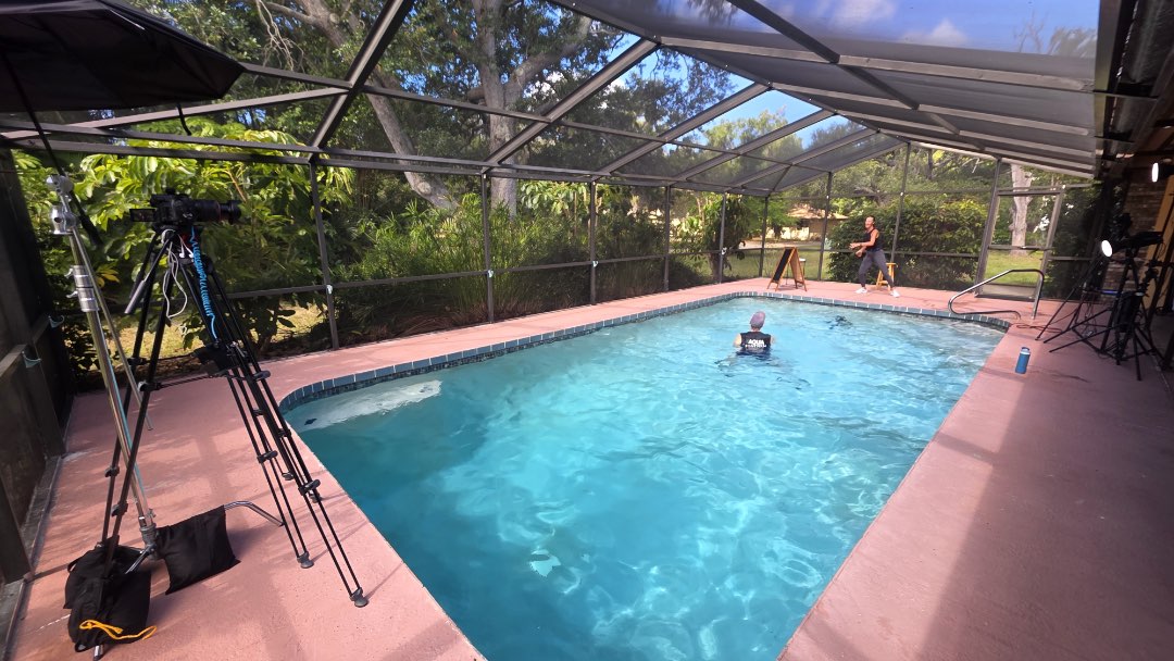 Filming Sweat Strength Reset pool workout for the Poolfit app