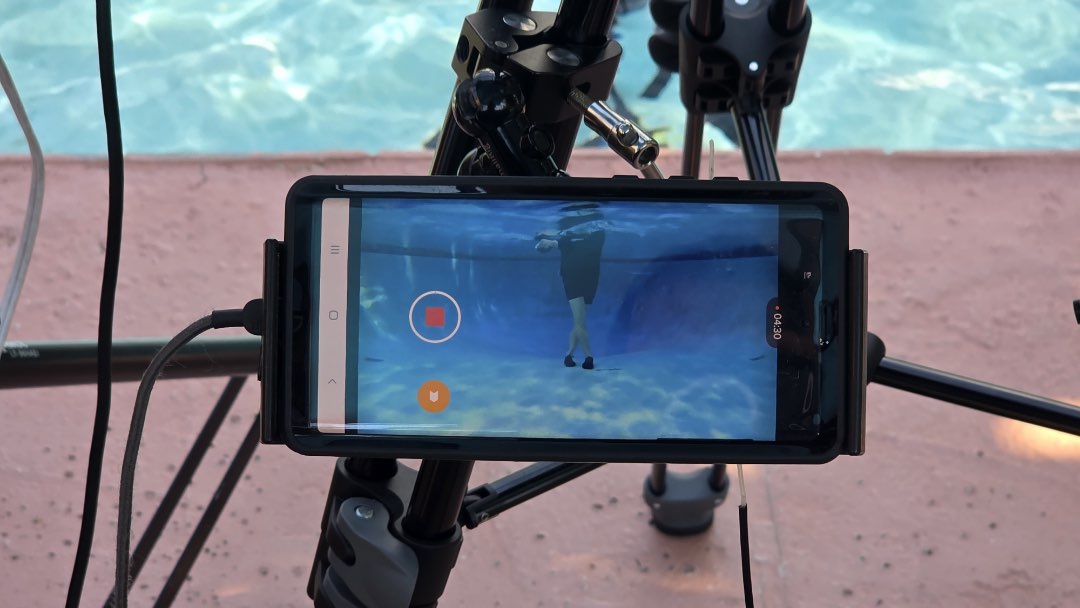 Filming a 20 minute joint mobility and muscular flexibility pool workout for the Poolfit App..
