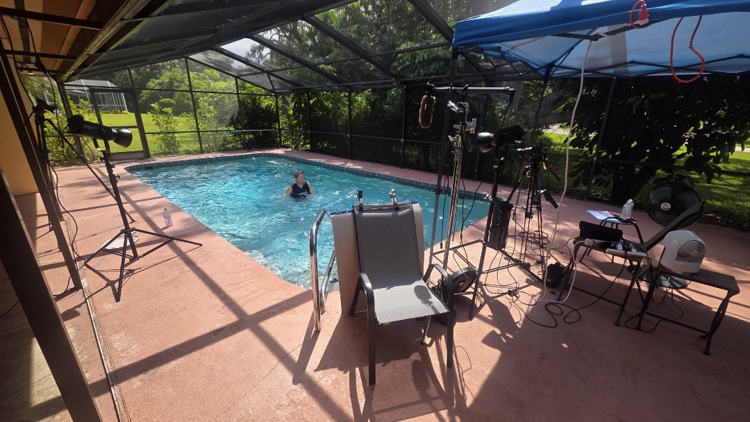 Filming a Halloween-themed aquatic fitness instructor videoo for Fitmotivation