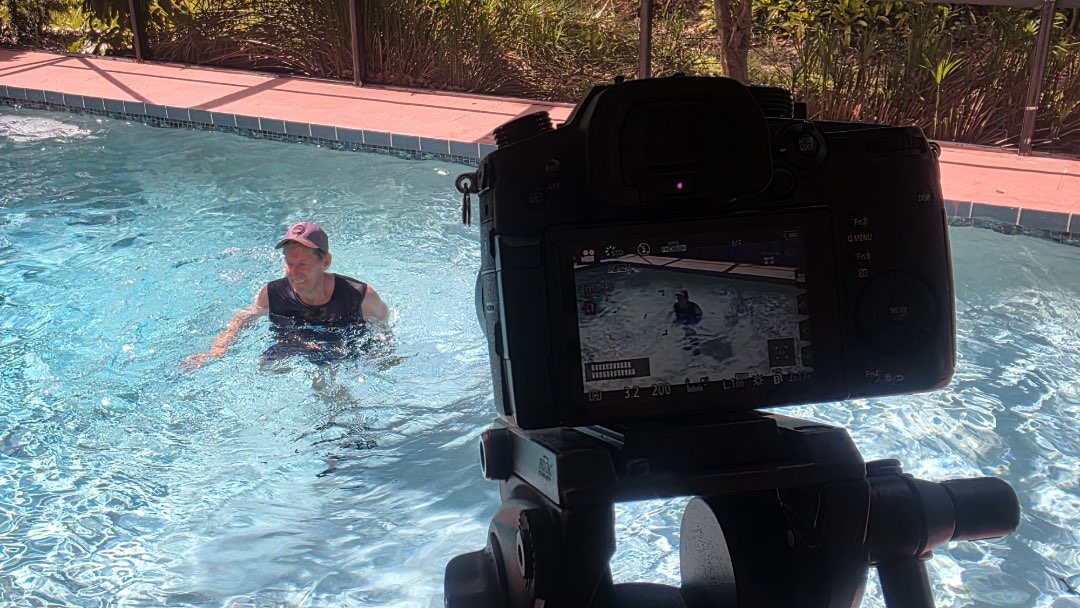 Filming an aqua fitness instructor video, Kick, Punch & Crunch, for Fitmotivation.com