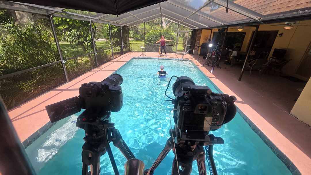 On the filming set for Fitmotivation video streaming platform, filming the aquatic fitness instructor video, Tidal HIIT Mixes