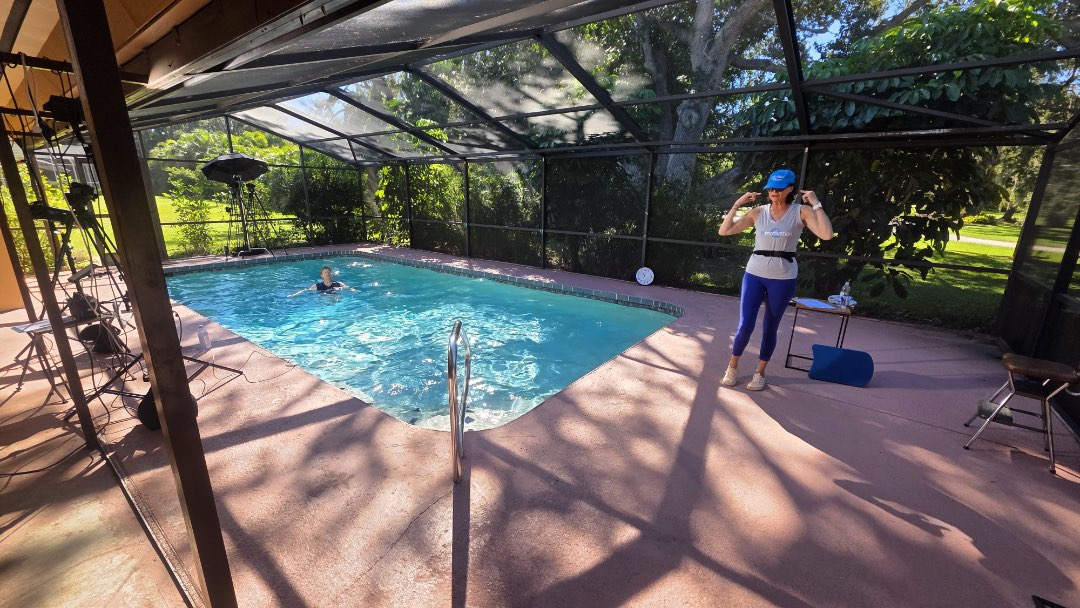Filming a deep water exercise class format for Fitmotivation, an aquatic fitness instructor video-on-demand platform.